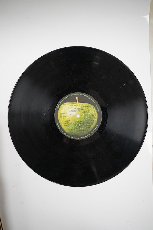 Seventeen LP record albums, including a stereo The Beatles ‘White Album’, top loading cover with one black inner sleeve (one missing), no. 0536905, together with artist including; Wings, the Byrds, the Carpenters, John L